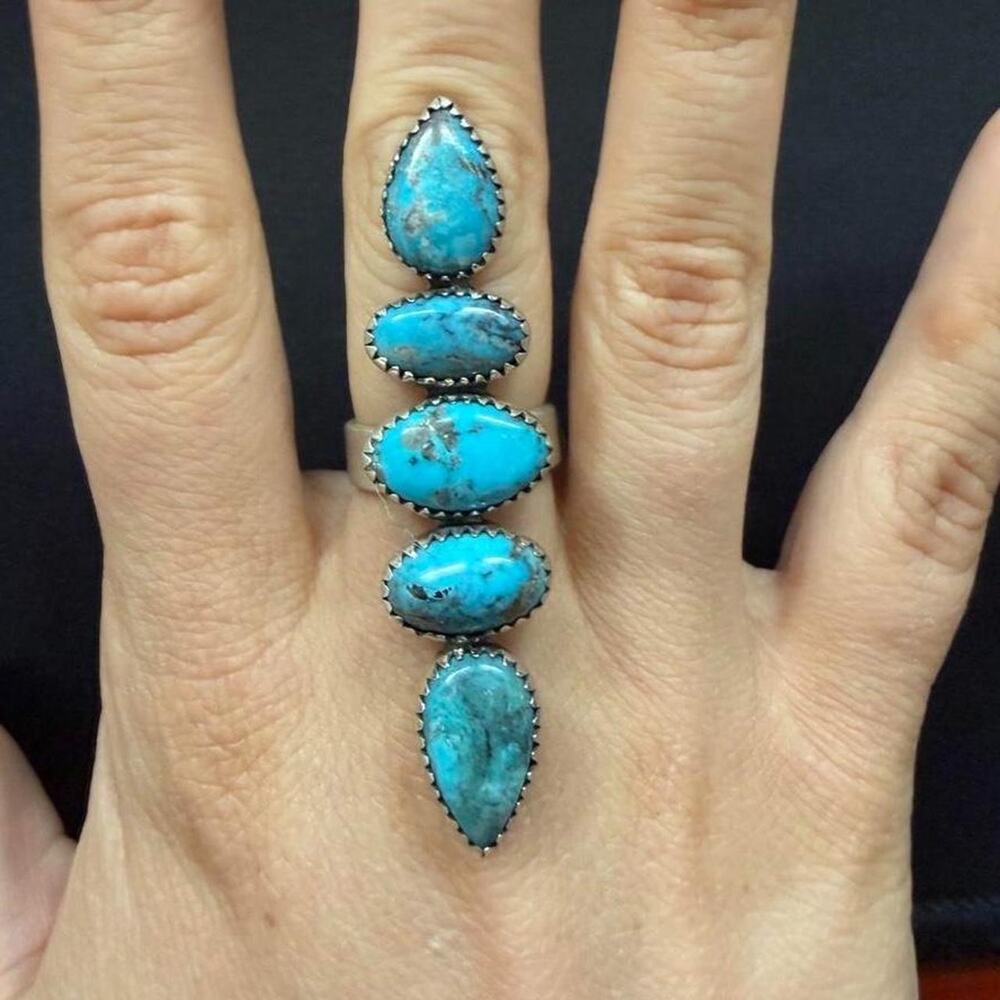 Sterling silver ithaca peaks turquoise crawler ring. Adjustable band